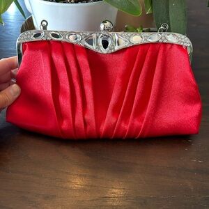 Red satin couch with removable chain strap